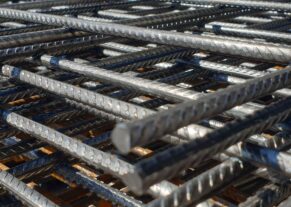 Steel Reinforcement Manufacturers producing high-quality rebar in a factory